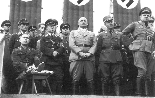 Franz Hofer with his injured foot on a cushion, at the 5th 'Reichsparteitag der NSDAP' in Nürnburg, September 1933. To his left are Theo Habicht, Julius Straycher, Josef Wagner, and Fritz Sauckel